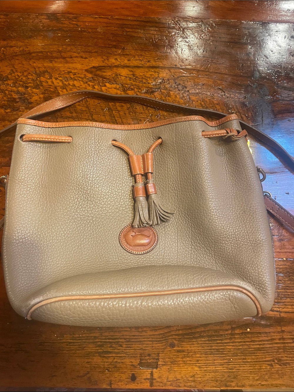 Vintage Dooney Burke Leather Tassel Drawstring Shoulder Bag in Taupe and Brown
